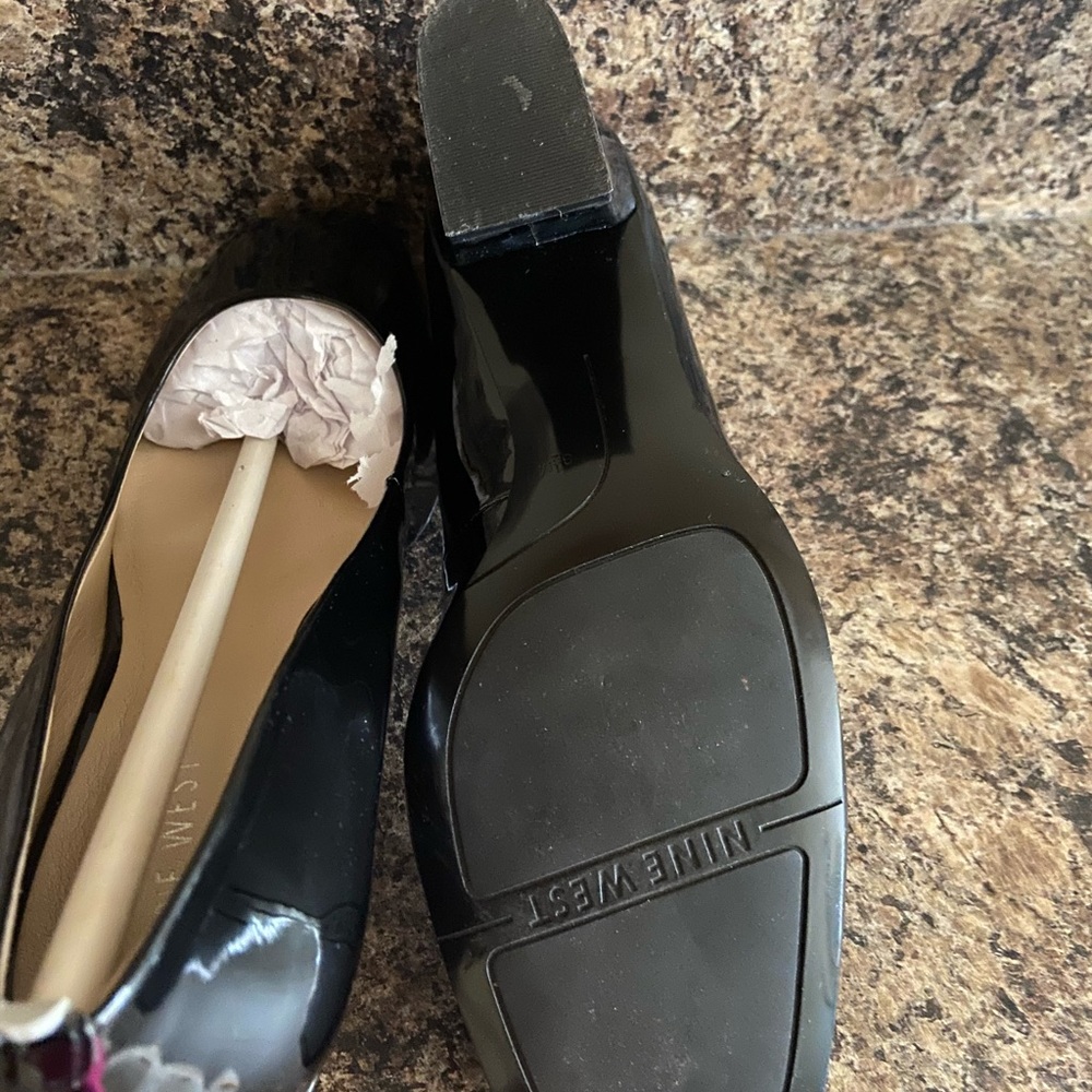 Nine West black patent leather shoes.  Never worn